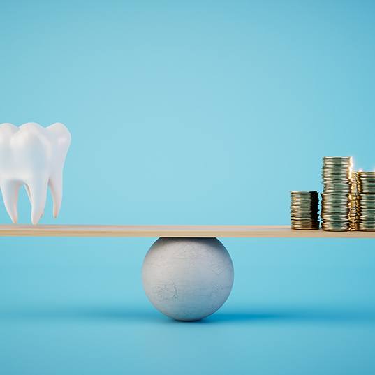 A 3D rendering of a scale on which gold coins and a model tooth are balanced