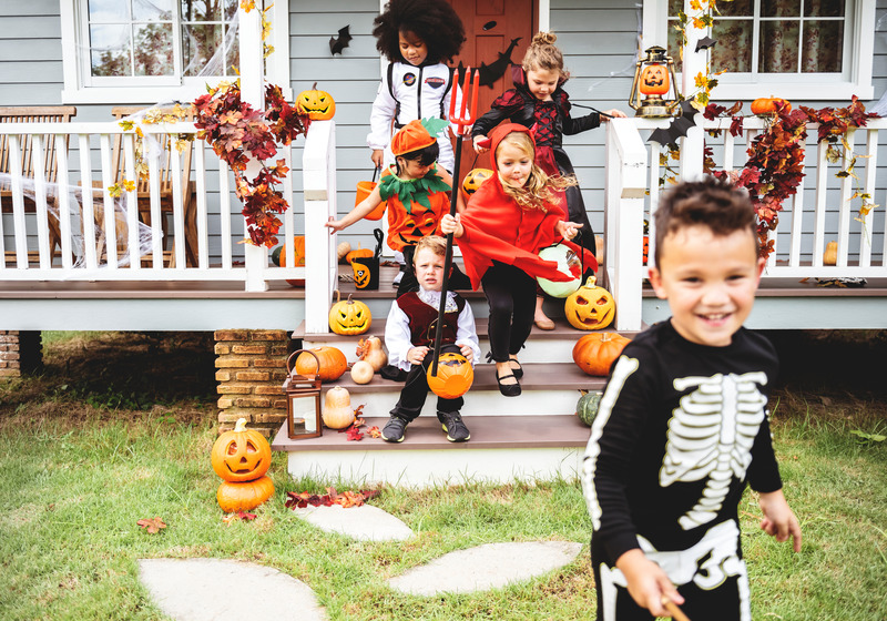 Children enjoying Halloween without cavities